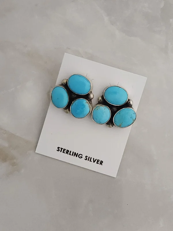 Worn flair earrings-Stamped Sterling Silver Turquoise 3 Stone Earrings