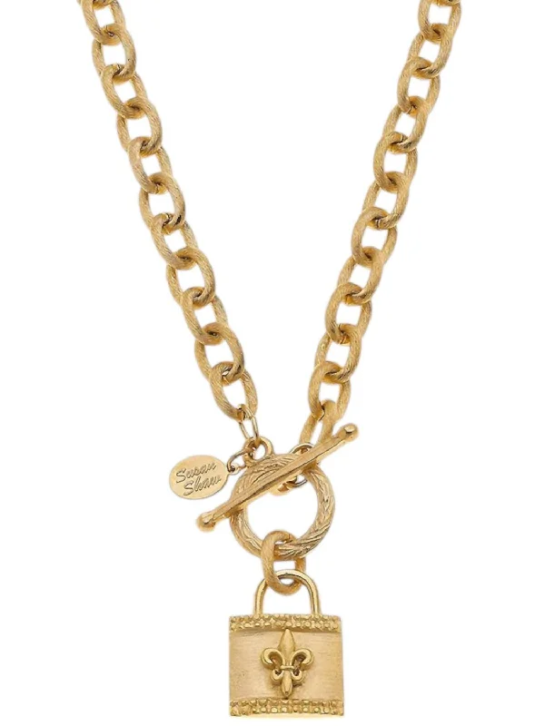 Flax cord necklaces-Fleur De Lis Lock Chain Toggle Necklace In Gold